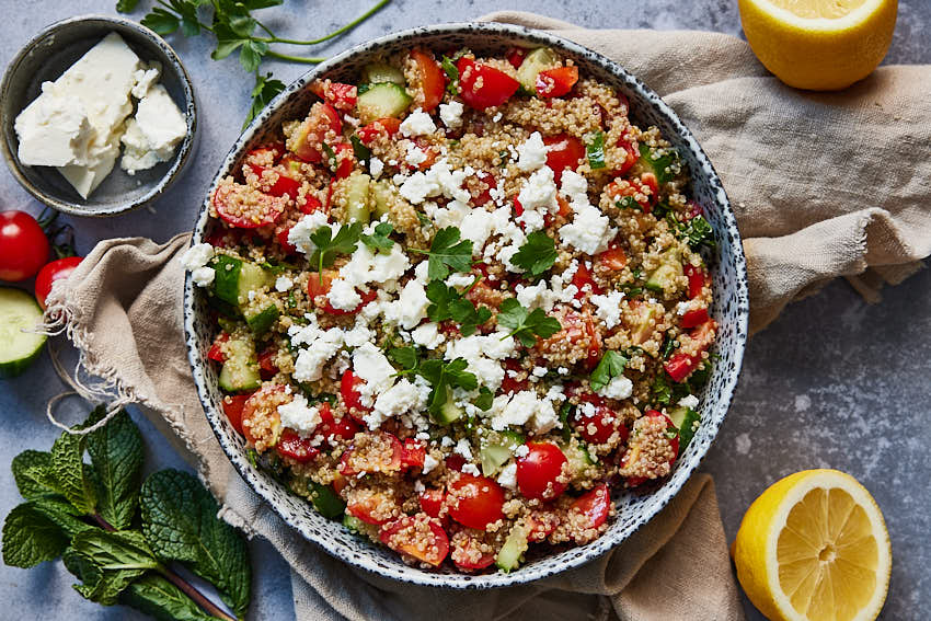 Close-up of quinoa salad on a fork